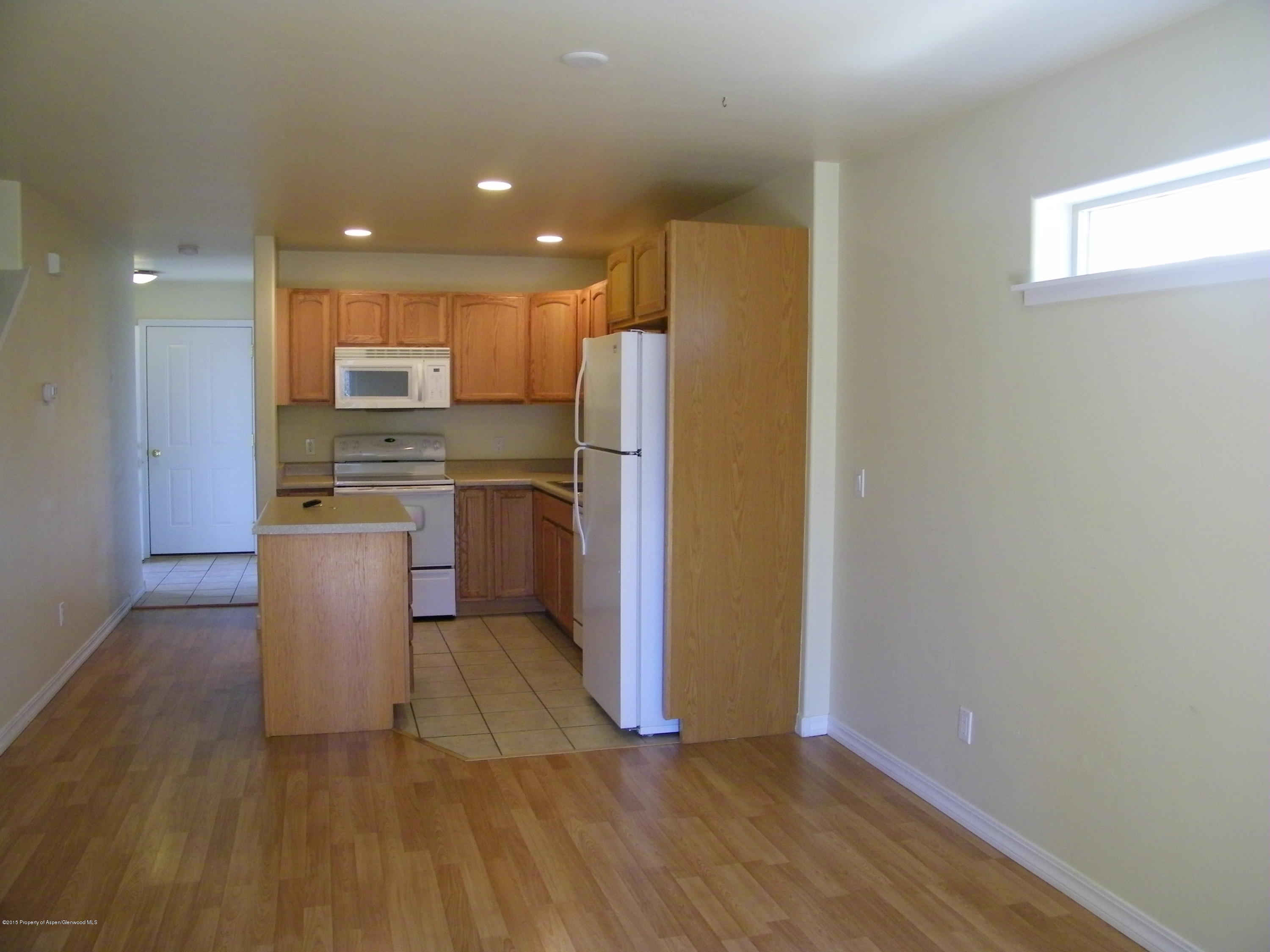 1018 East Avenue, Unit 5 Rifle, CO 81650 - Photo 4 of 8 living into kitchen.JPG