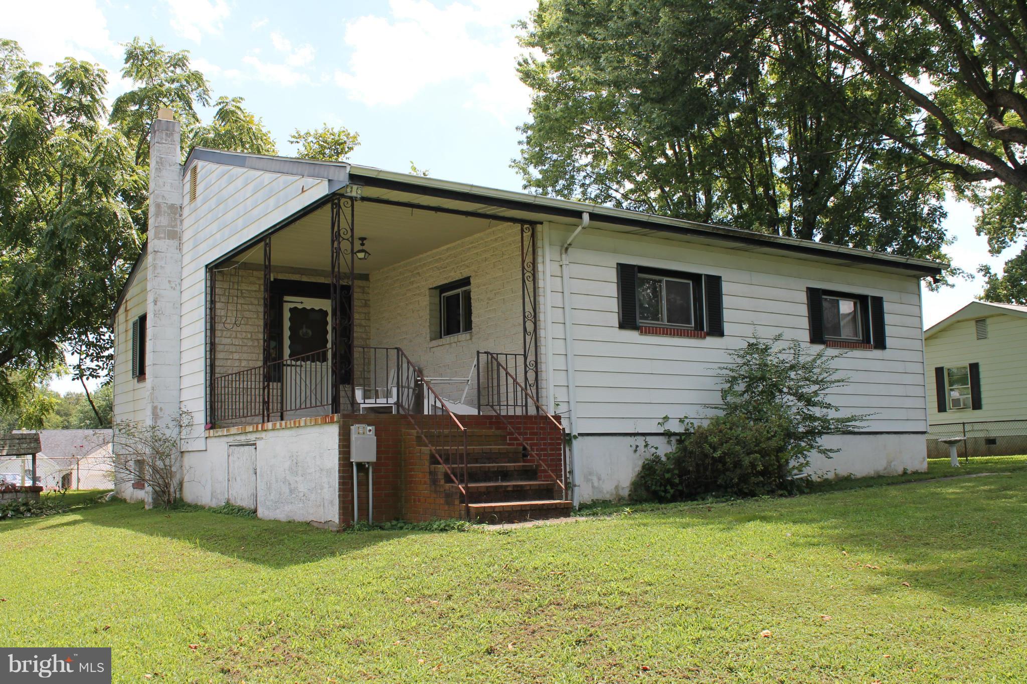 2335 Poplar Road Baltimore, MD 21221 - Photo 1 of 15 a view of a house with back yard