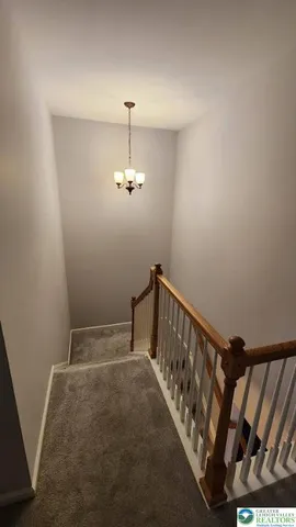 a view of a hallway with entryway