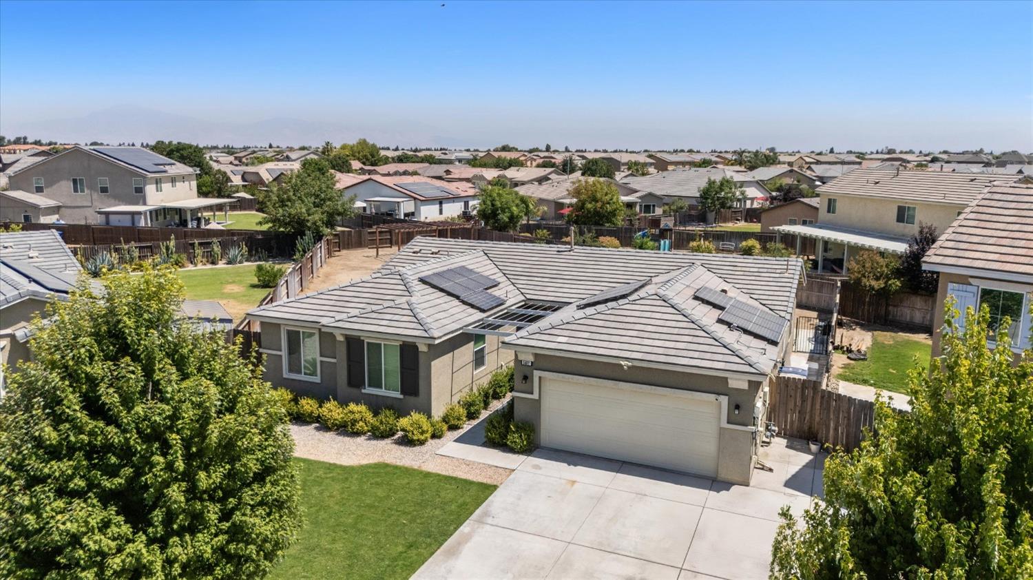 5407 Mensen Drive Bakersfield, CA 93313 - Photo 2 of 36 an aerial view of multiple house