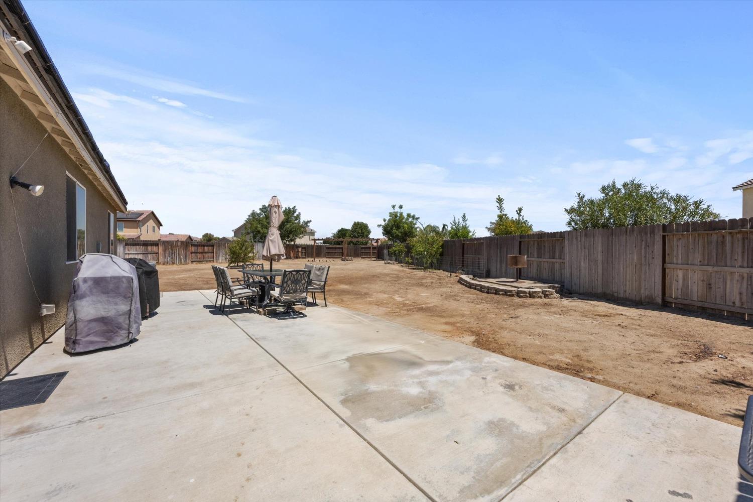 5407 Mensen Drive Bakersfield, CA 93313 - Photo 28 of 36 a view of a terrace with chairs