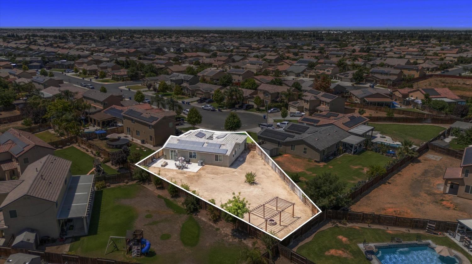 5407 Mensen Drive Bakersfield, CA 93313 - Photo 34 of 36 an aerial view of a house with a garden