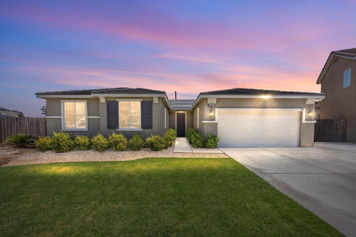 5407 Mensen Drive Bakersfield, CA 93313 - Photo 36 of 36 a front view of house with yard and green space