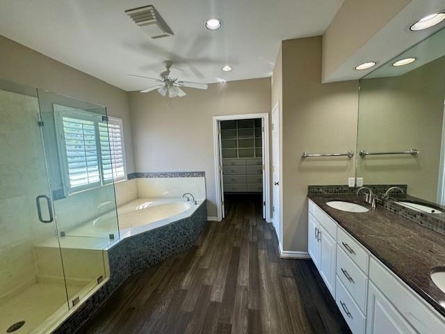 407 Quick Silver Horseshoe Bay, TX 78657 - Photo 19 of 31 a spacious bathroom with a granite countertop tub sink and mirror