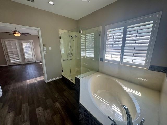 407 Quick Silver Horseshoe Bay, TX 78657 - Photo 20 of 31 a spacious bathroom with a granite countertop tub sink and mirror