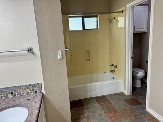 407 Quick Silver Horseshoe Bay, TX 78657 - Photo 25 of 31 a bathroom with a sink a toilet and shower