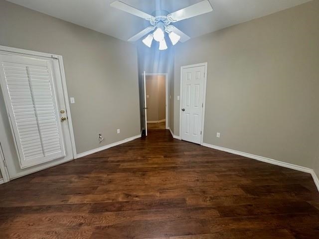 407 Quick Silver Horseshoe Bay, TX 78657 - Photo 27 of 31 an empty room with closet and a chandelier fan