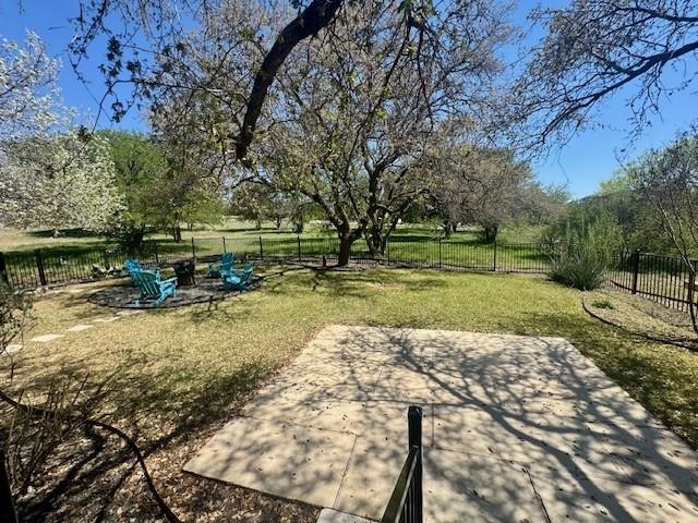 407 Quick Silver Horseshoe Bay, TX 78657 - Photo 30 of 31 a view of a yard with a tree