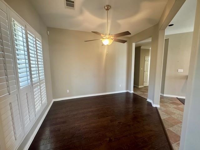 407 Quick Silver Horseshoe Bay, TX 78657 - Photo 10 of 31 an empty room with wooden floor and windows
