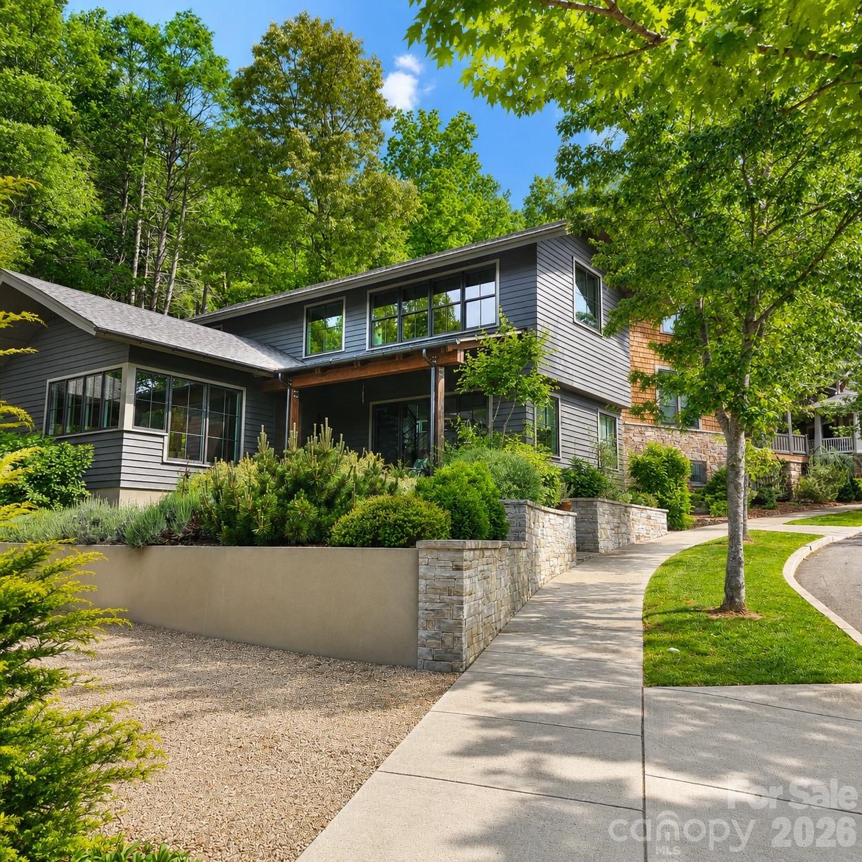 18 Wordsworth Road Black Mountain, NC 28711 - Photo 2 of 23 a front view of a house with a garden