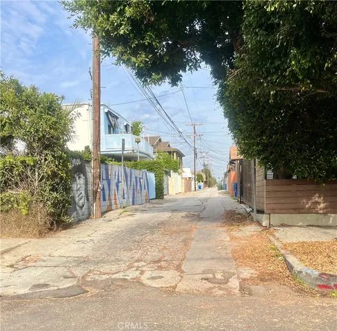 a view of a backyard of the house