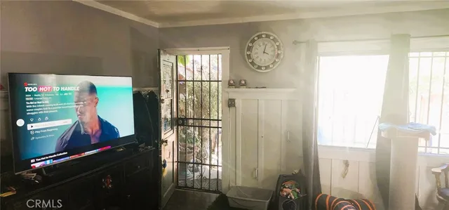 a room with furniture and a window