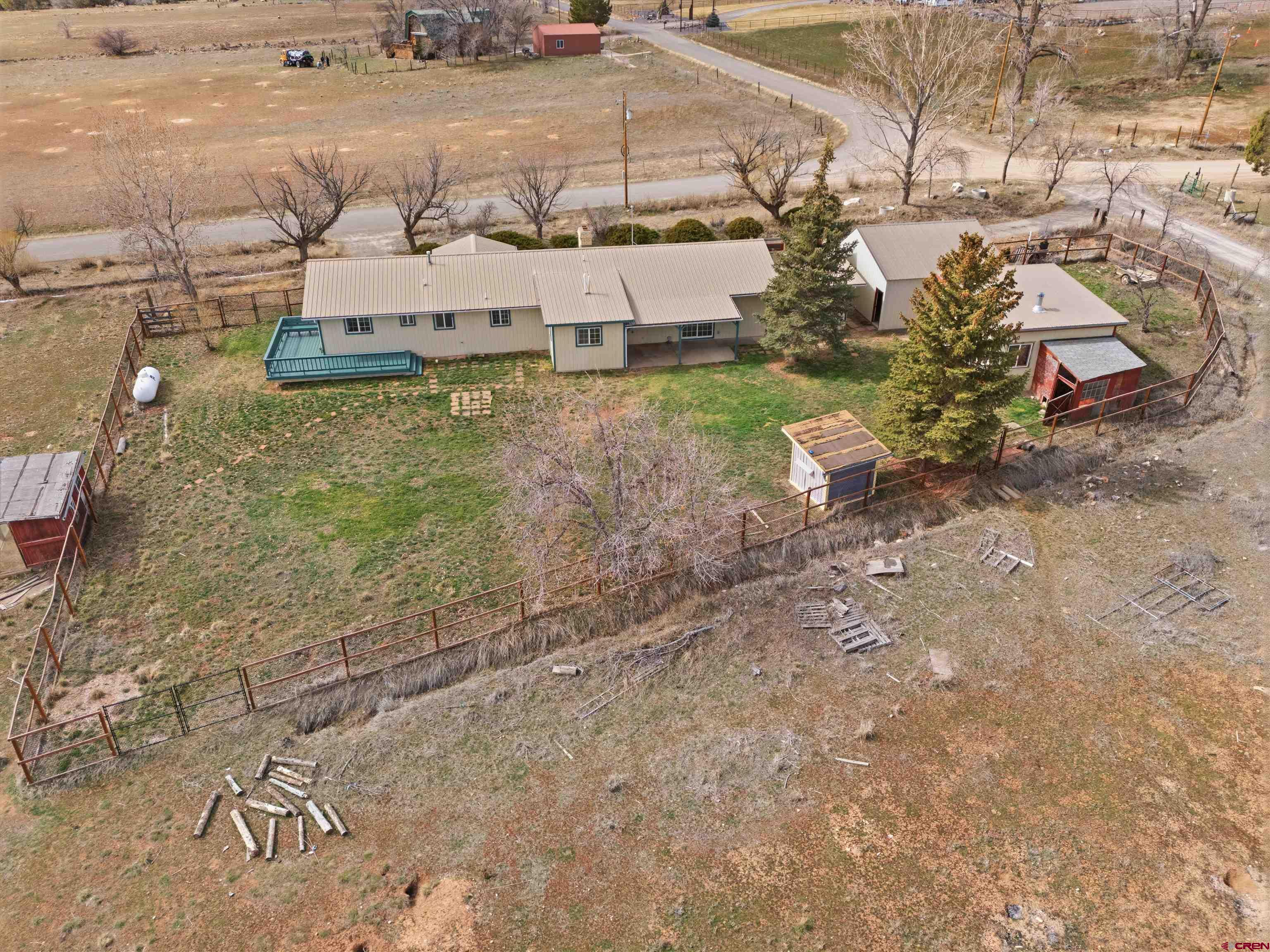 16216 2600th Road Cedaredge, CO 81413 - Photo 40 of 45 a view of a yard with an outdoor space