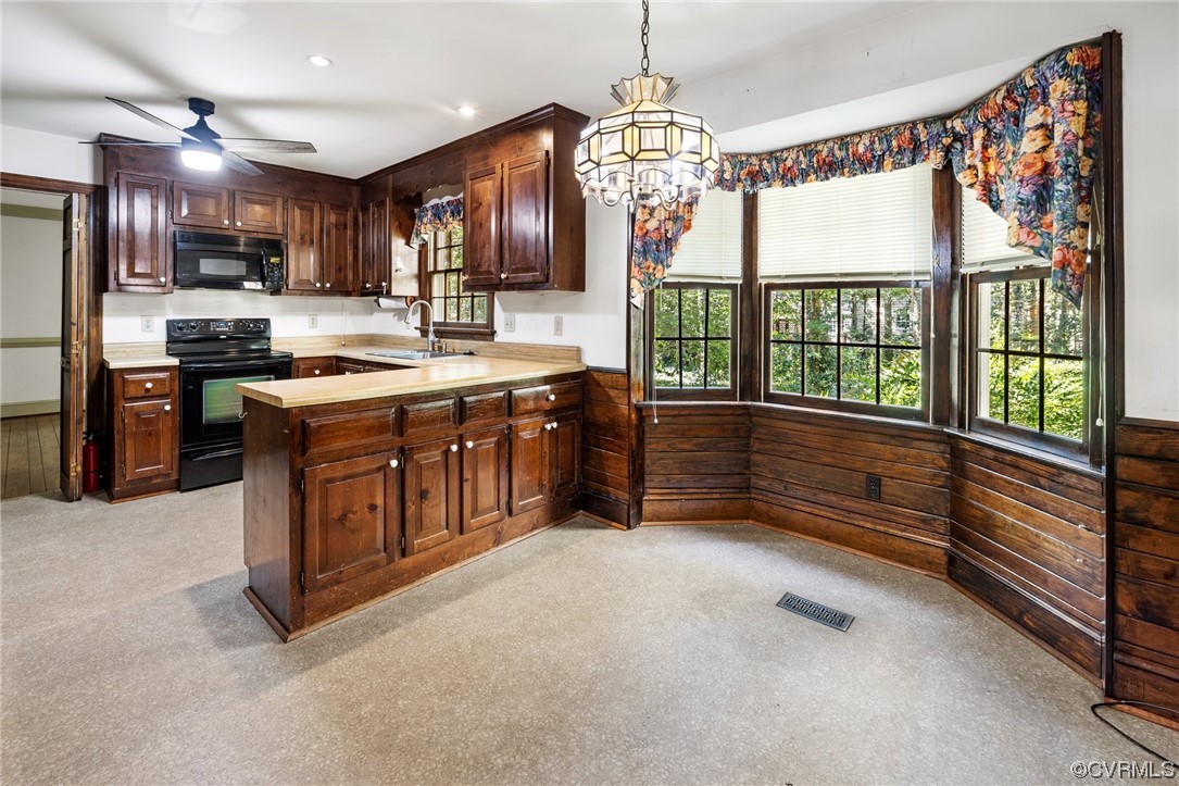 1806 Plain View Road Henrico, VA 23238 - Photo 15 of 33 a kitchen with granite countertop a stove and a sink