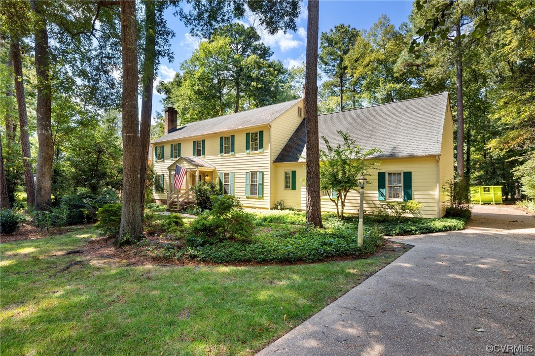 1806 Plain View Road Henrico, VA 23238 - Photo 2 of 33 a view of a house with a yard and potted plants