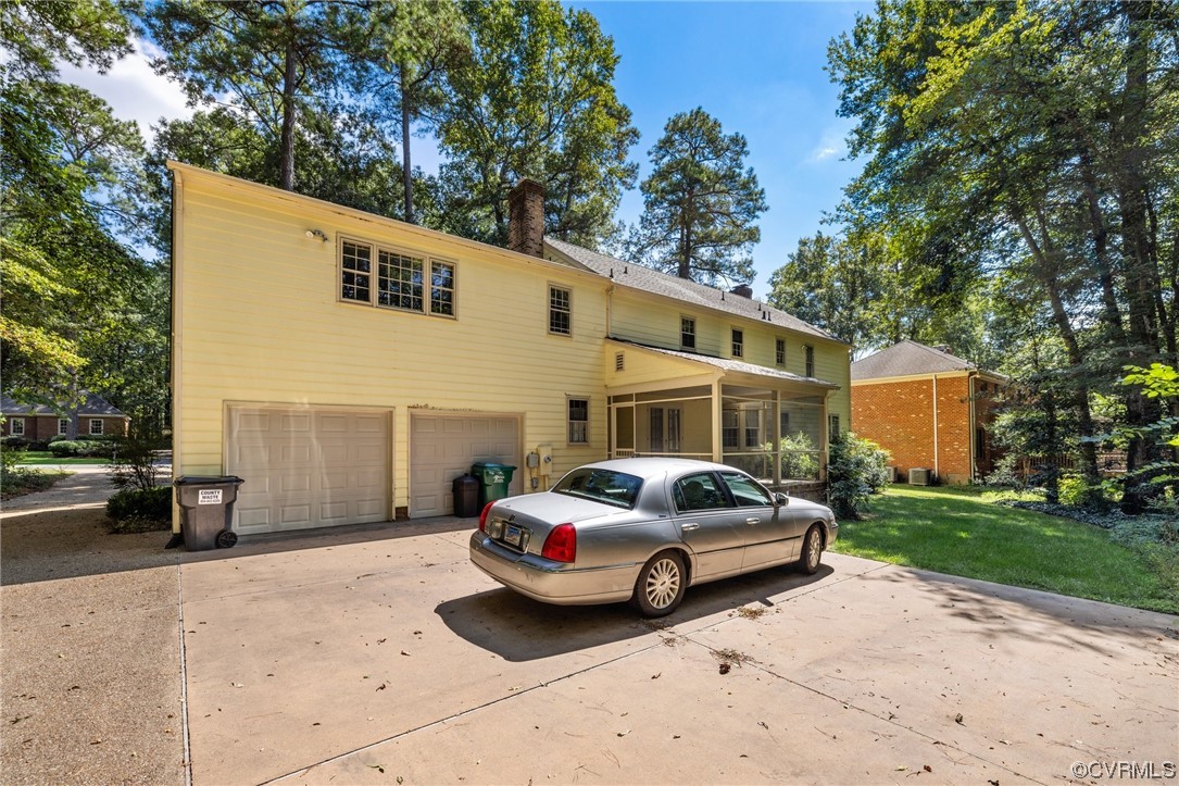 1806 Plain View Road Henrico, VA 23238 - Photo 33 of 33 a front view of a house with a garden
