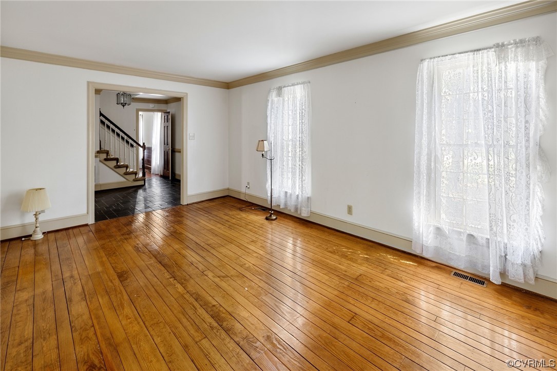 1806 Plain View Road Henrico, VA 23238 - Photo 8 of 33 wooden floor in an empty room with a window