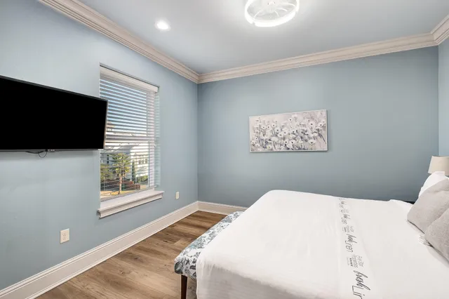 a front view of a building with a table and chairs