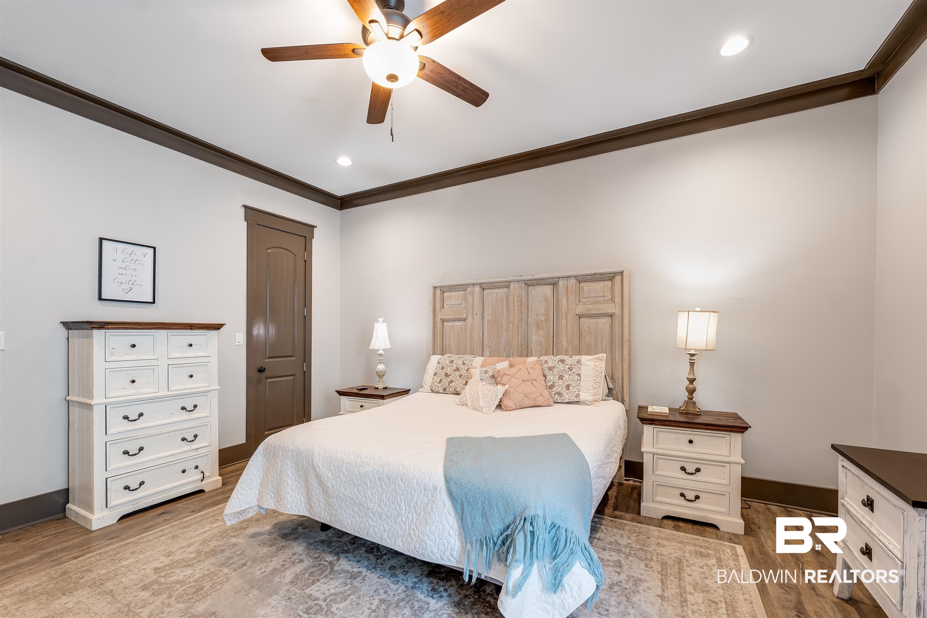 1119 Pink Poppy Lane Foley, AL 36535 - Photo 12 of 38 Primary bedroom on main floor with walk-in closet and en-suite.