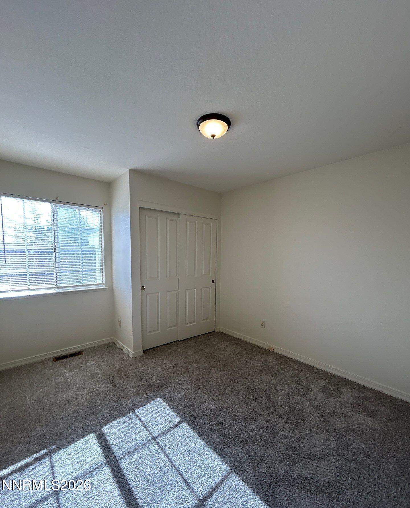 3951 Aspendale Drive Reno, NV 89503 - Photo 16 of 22 an empty room with a window