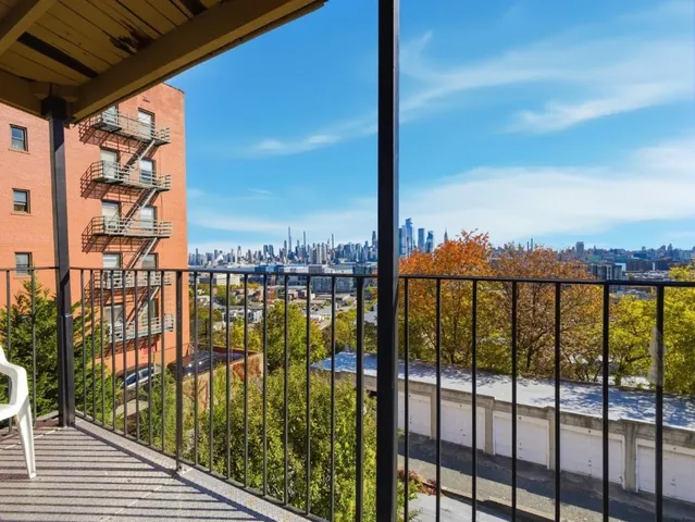 a view of city from a balcony
