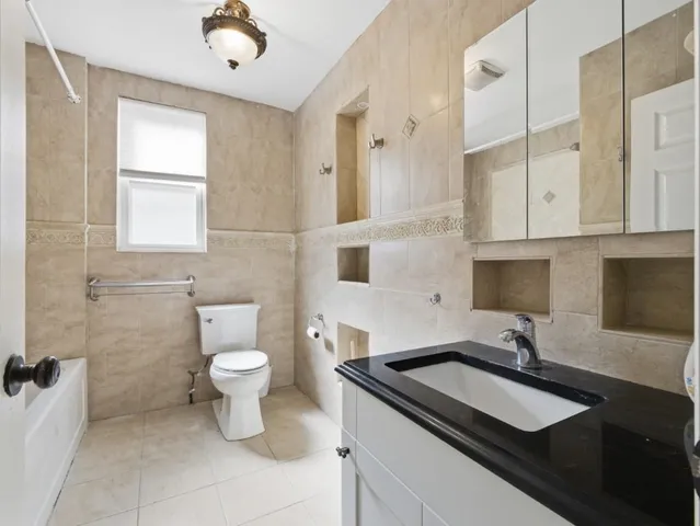 a bathroom with a sink and a toilet