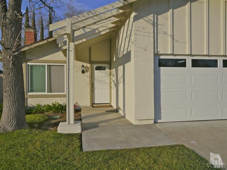 13421 Laurelhurst Road Moorpark, CA 93021 - Photo 2 of 28 a front view of a house with a yard