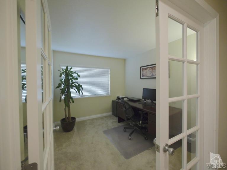 13421 Laurelhurst Road Moorpark, CA 93021 - Photo 12 of 28 a view of a workspace with furniture and a window