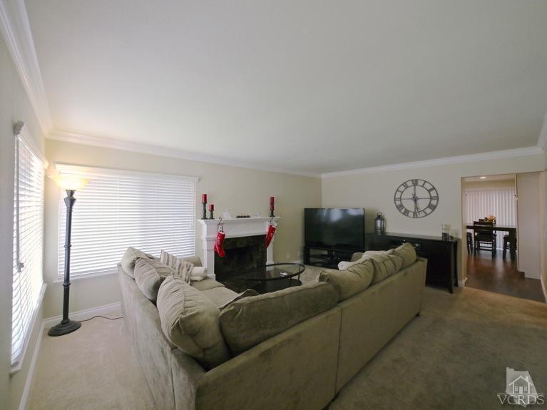 13421 Laurelhurst Road Moorpark, CA 93021 - Photo 3 of 28 a living room with furniture a computer on the desk and chair