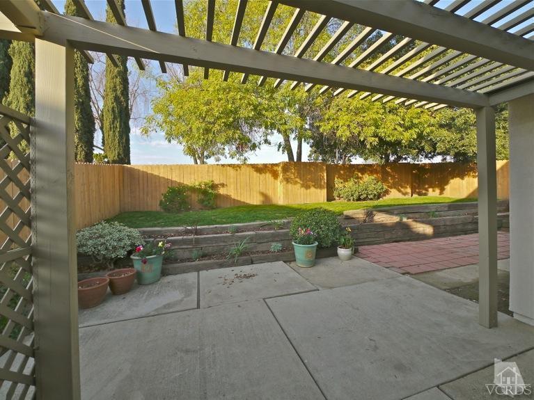 13421 Laurelhurst Road Moorpark, CA 93021 - Photo 24 of 28 a view of porch with a table and chairs
