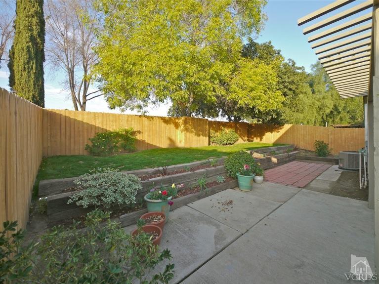 13421 Laurelhurst Road Moorpark, CA 93021 - Photo 25 of 28 a view of a yard with flower plants