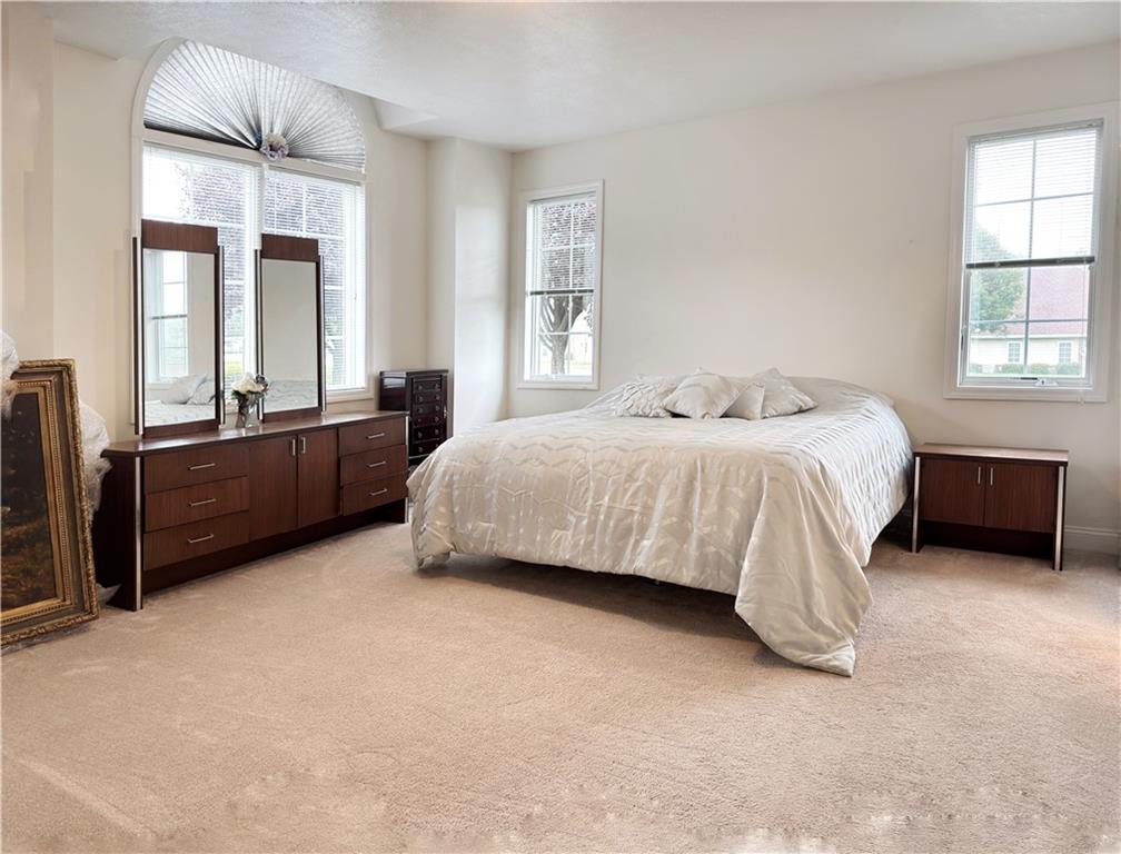 67 Nicholas Drive Beaver, PA 15009 - Photo 12 of 27 a bedroom with a bed dresser and a window