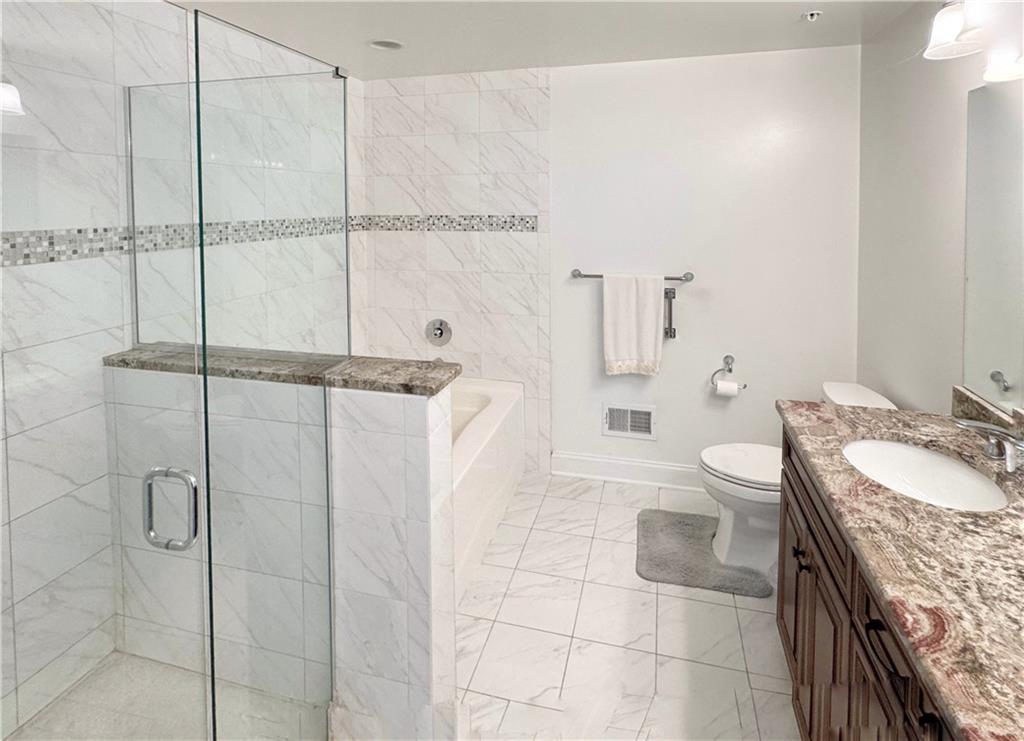 67 Nicholas Drive Beaver, PA 15009 - Photo 14 of 27 a bathroom with a granite countertop sink mirror vanity and toilet