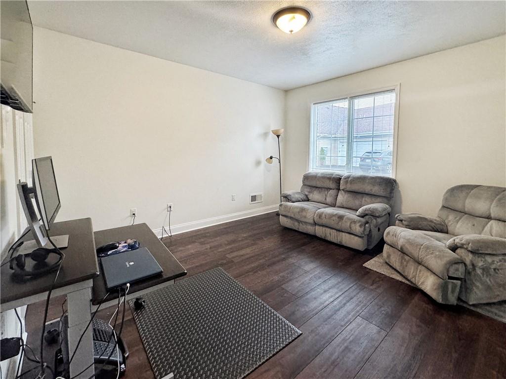 67 Nicholas Drive Beaver, PA 15009 - Photo 16 of 27 a living room with furniture and a flat screen tv