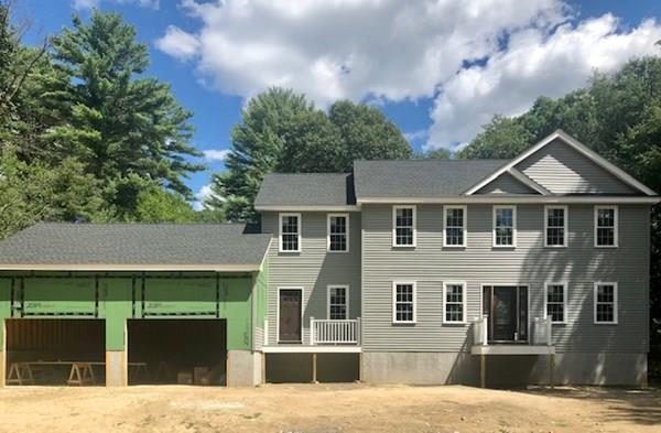 1008 Walnut Plain Road Rochester, MA 02770 - Photo 1 of 2 a front view of a house with a yard