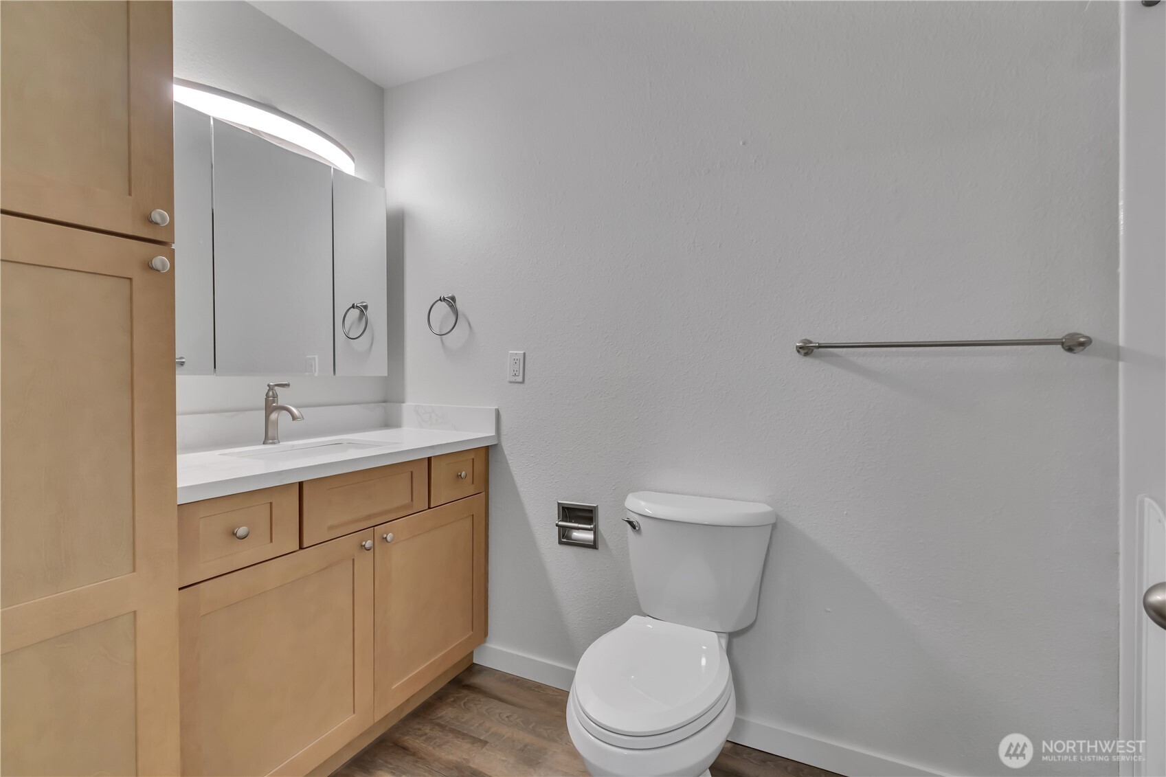 2728 Natalie Lane Steilacoom, WA 98388 - Photo 15 of 23 a bathroom with a toilet a sink a vanity and mirror