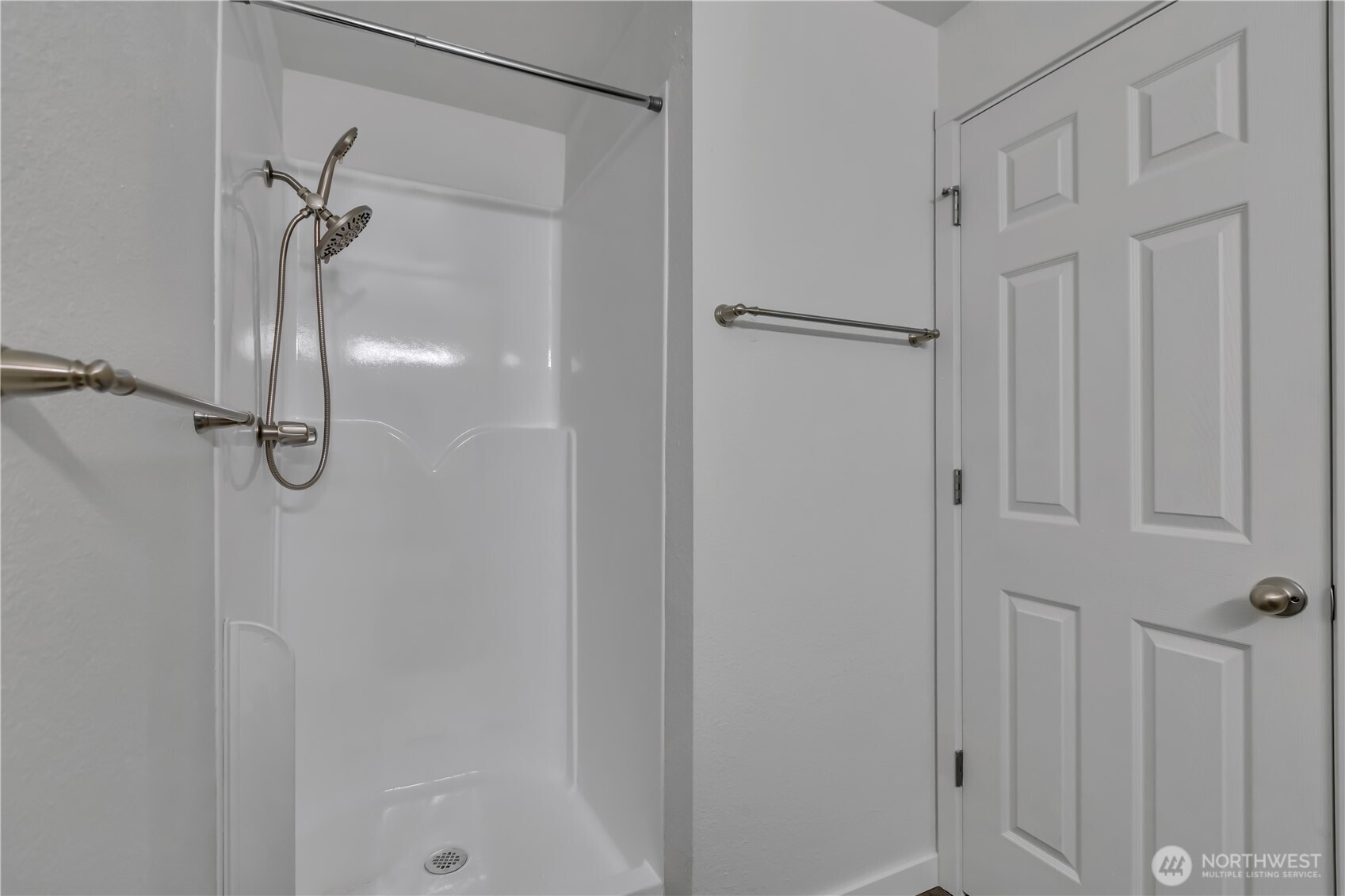 2728 Natalie Lane Steilacoom, WA 98388 - Photo 16 of 23 a bathroom with a glass shower door