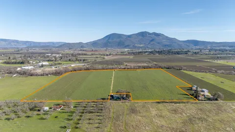 a view of a lake with a mountain in the background