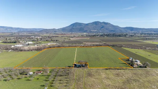 a view of a lake with a mountain in the background