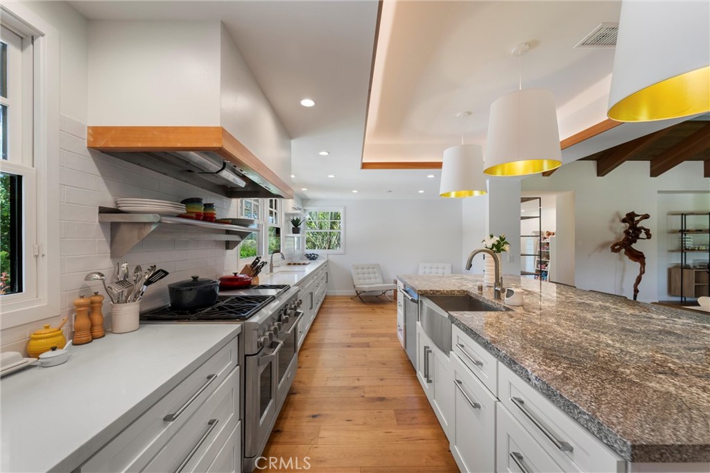 7337 La Soldadera Rancho Santa Fe, CA 92067 - Photo 5 of 60 a kitchen with lots of counter top space