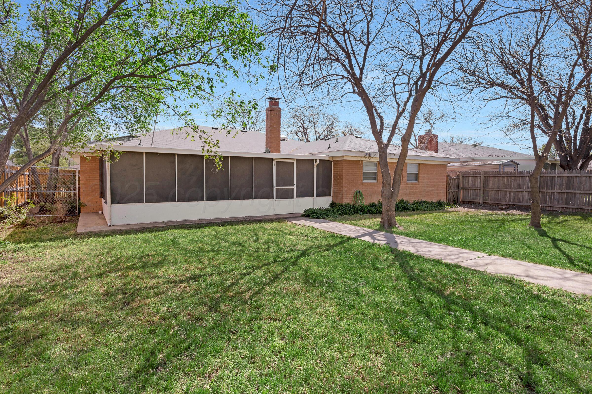4020 Tulane Drive Amarillo, TX 79109 - Photo 22 of 23 a view of a house with yard and tree s