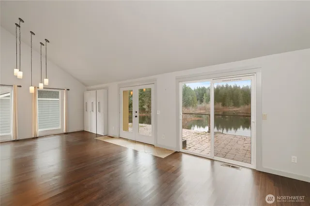 a view of a kitchen cabinets and wooden floor