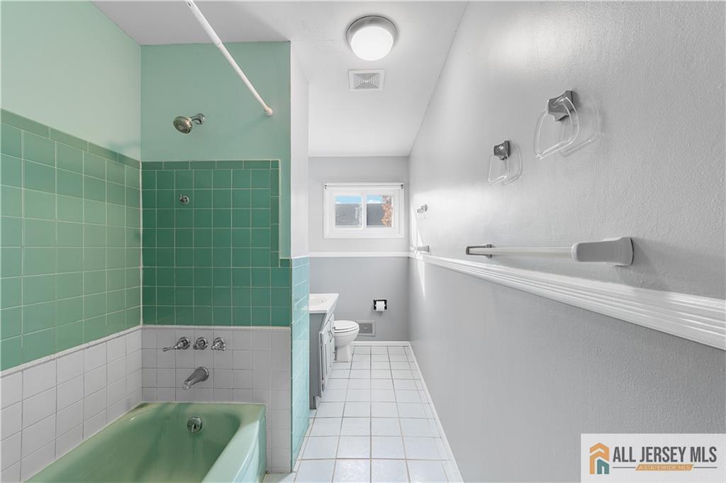 11 Wellesley Road Old Bridge, NJ 08859 - Photo 13 of 31 a bathroom with a bathtub sink and toilet