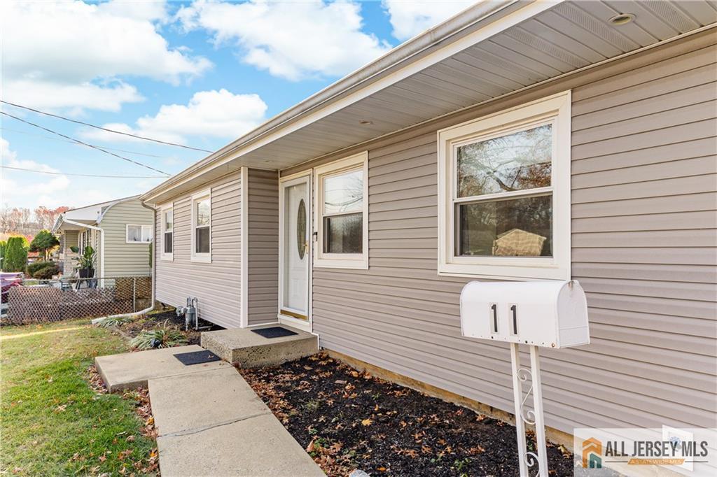 11 Wellesley Road Old Bridge, NJ 08859 - Photo 2 of 31 a backyard of a house with lots of green space