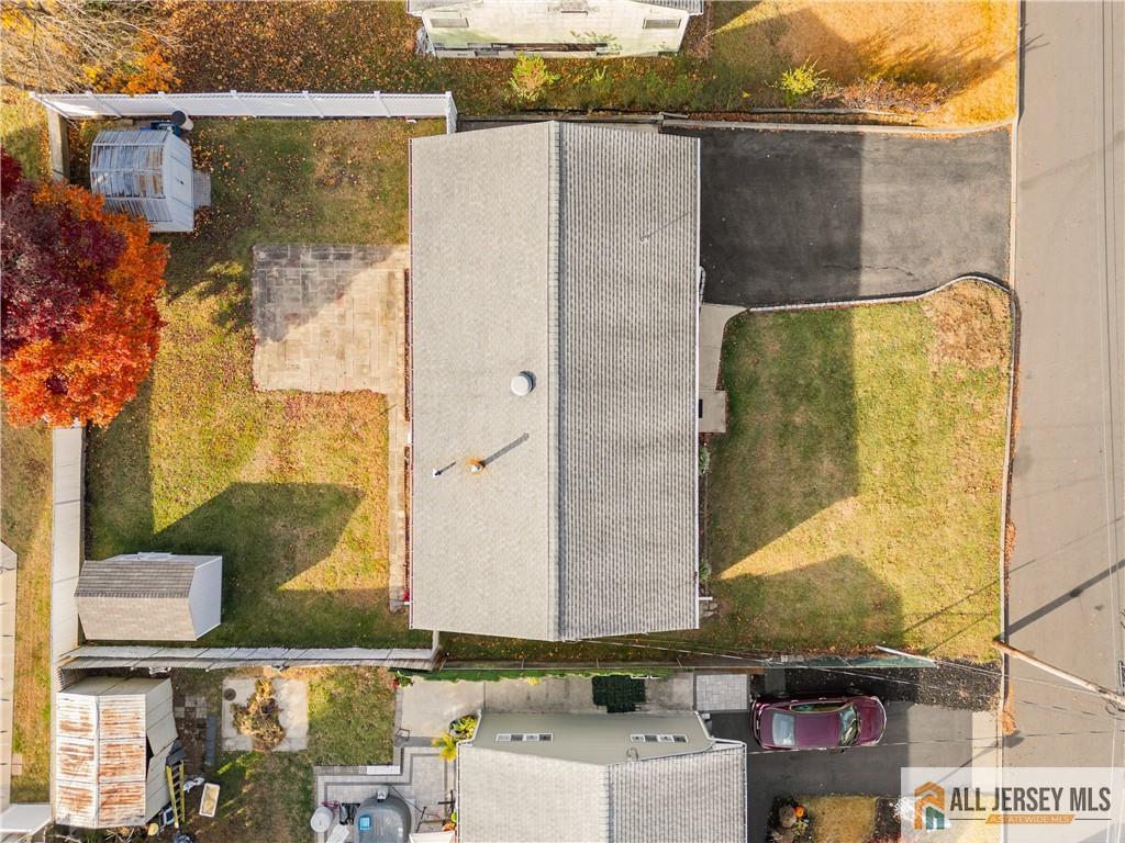 11 Wellesley Road Old Bridge, NJ 08859 - Photo 29 of 31 aerial view of a brick house with a large window