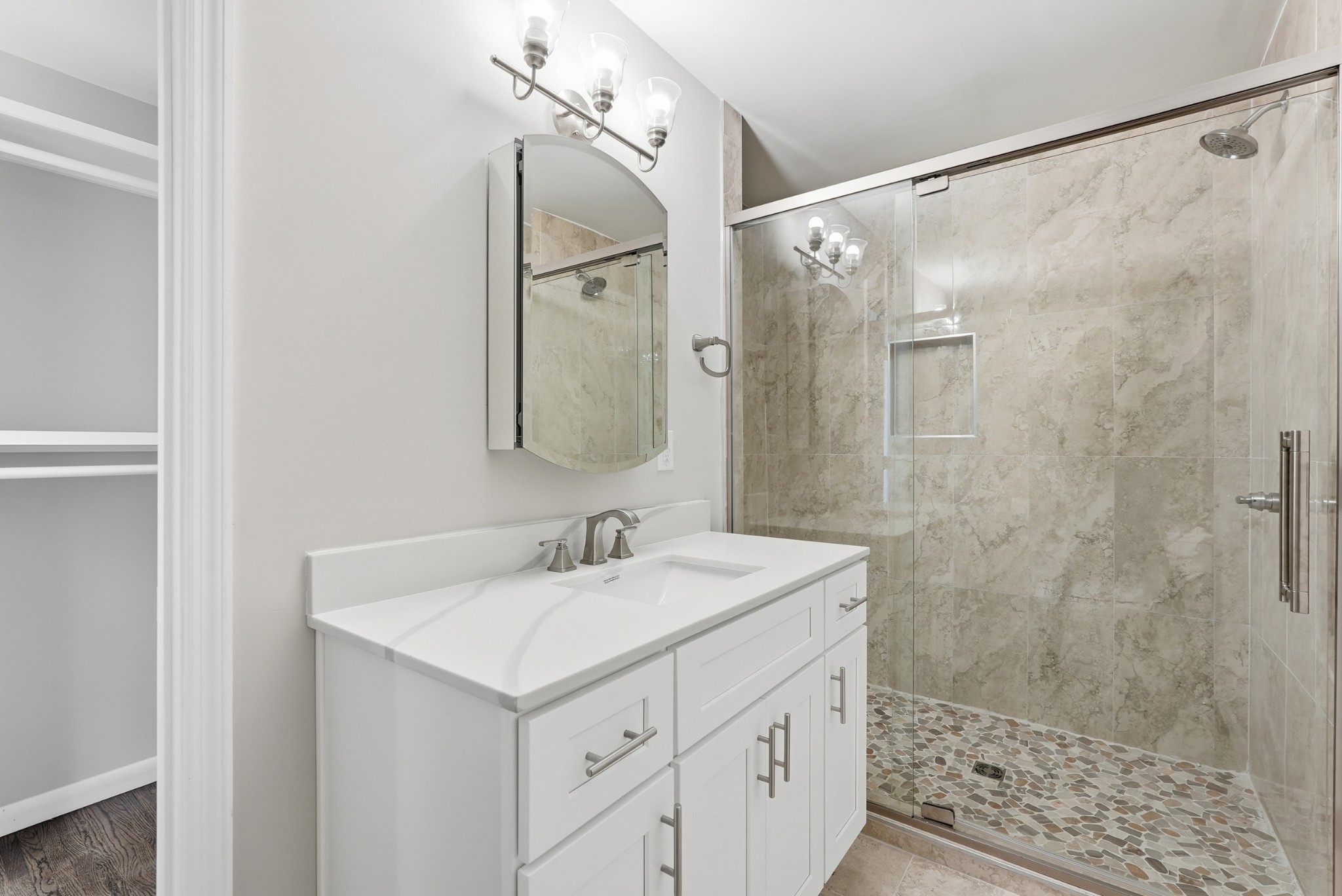 558 Walton Ferry Road Hendersonville, TN 37075 - Photo 11 of 28 a bathroom with a sink mirror and shower