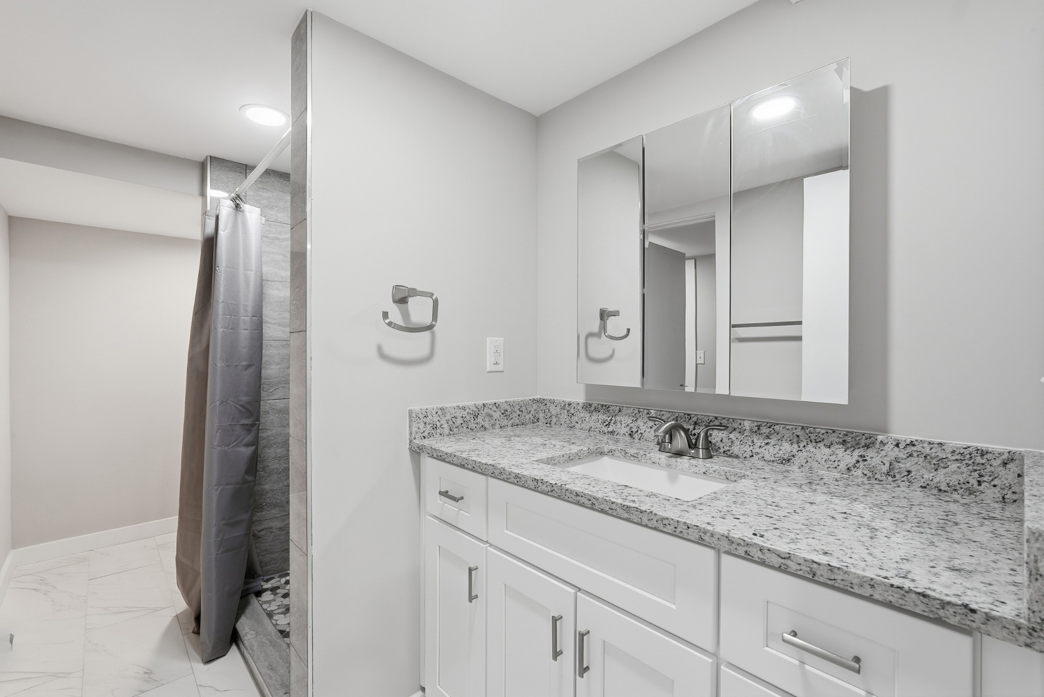 558 Walton Ferry Road Hendersonville, TN 37075 - Photo 18 of 28 a bathroom with a granite countertop sink and a mirror