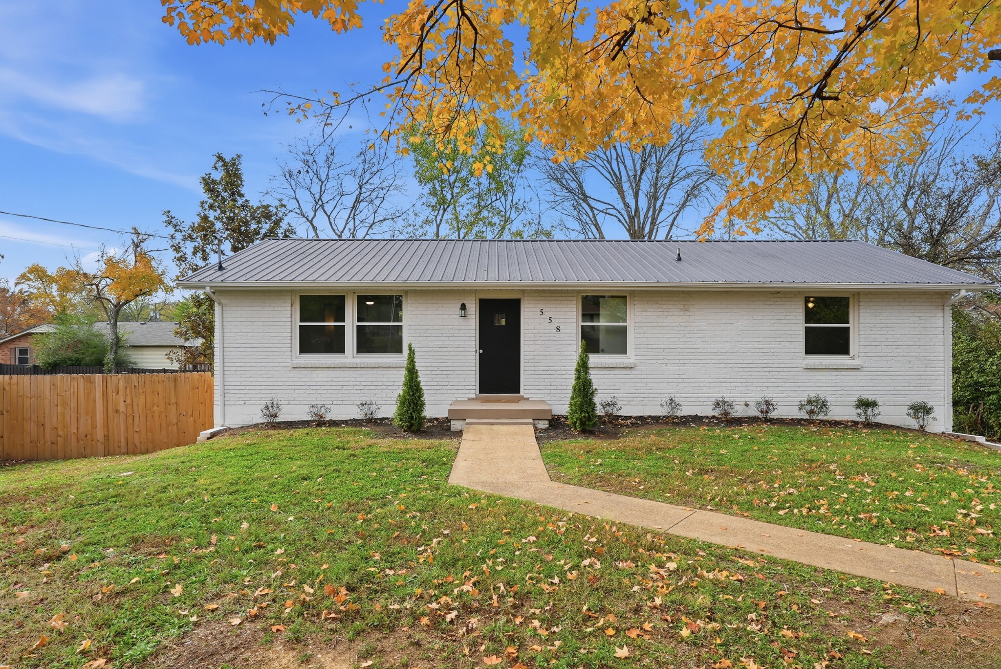 558 Walton Ferry Road Hendersonville, TN 37075 - Photo 4 of 28 a view of a house with a yard