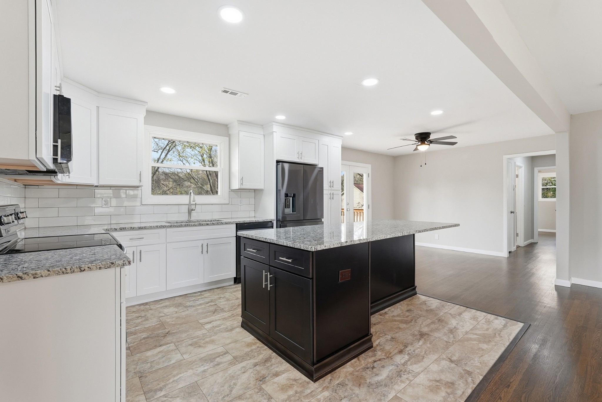 558 Walton Ferry Road Hendersonville, TN 37075 - Photo 8 of 28 a kitchen with stainless steel appliances granite countertop a stove and a sink