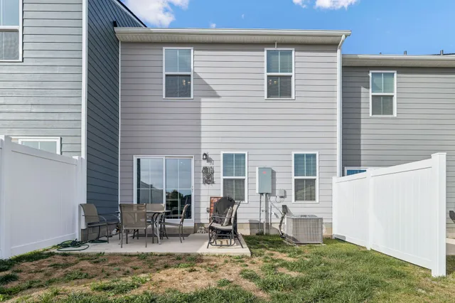 a backyard of a house with seating space